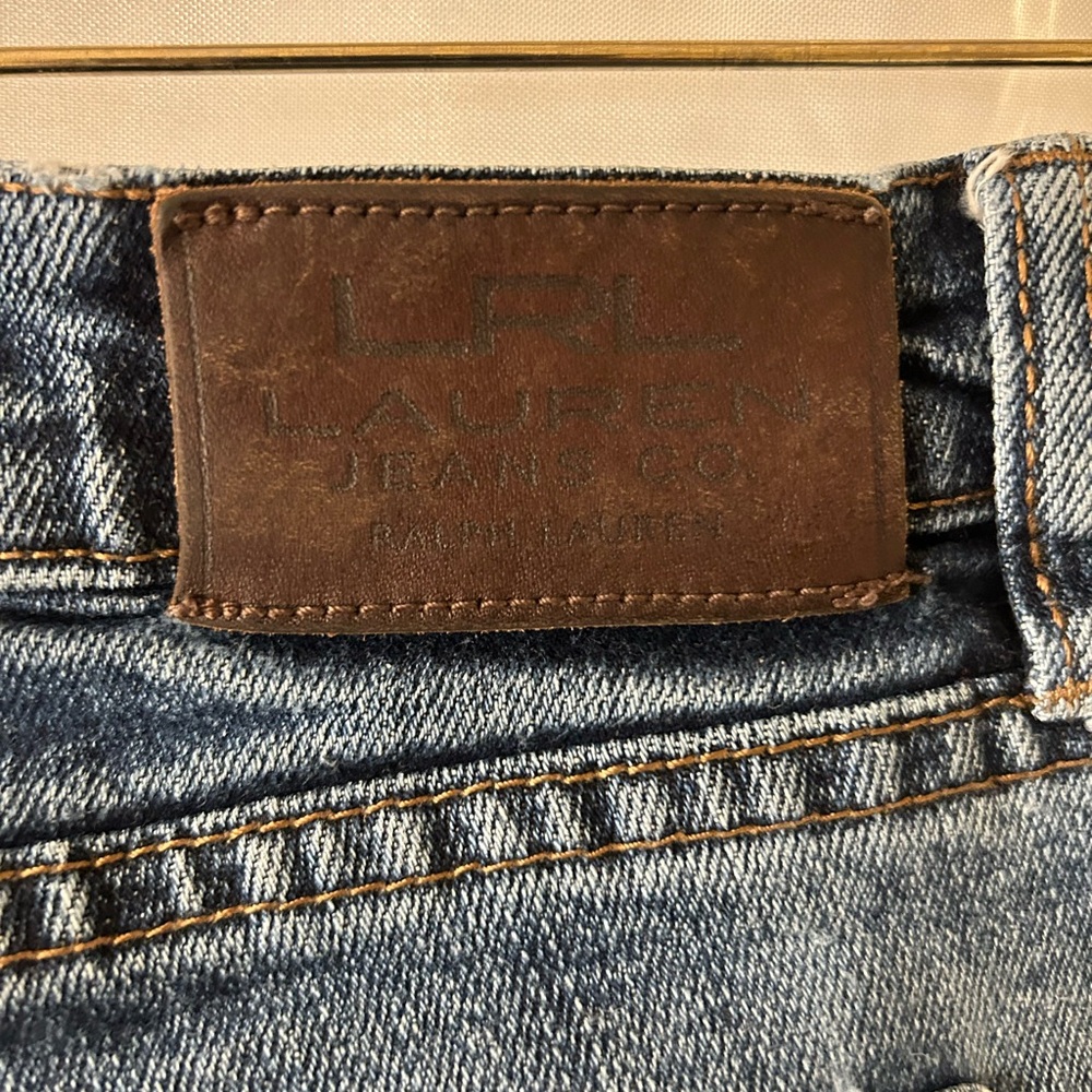 Classic Blue Jeans with Contrast Stitching and Leather Patch